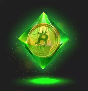 Shining green gemstone with a Bitcoin Coin inside